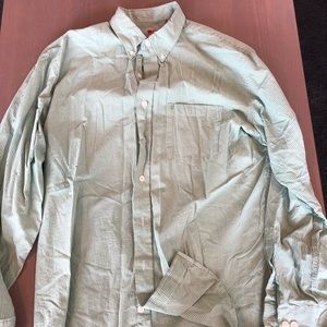 Green button down shirt.